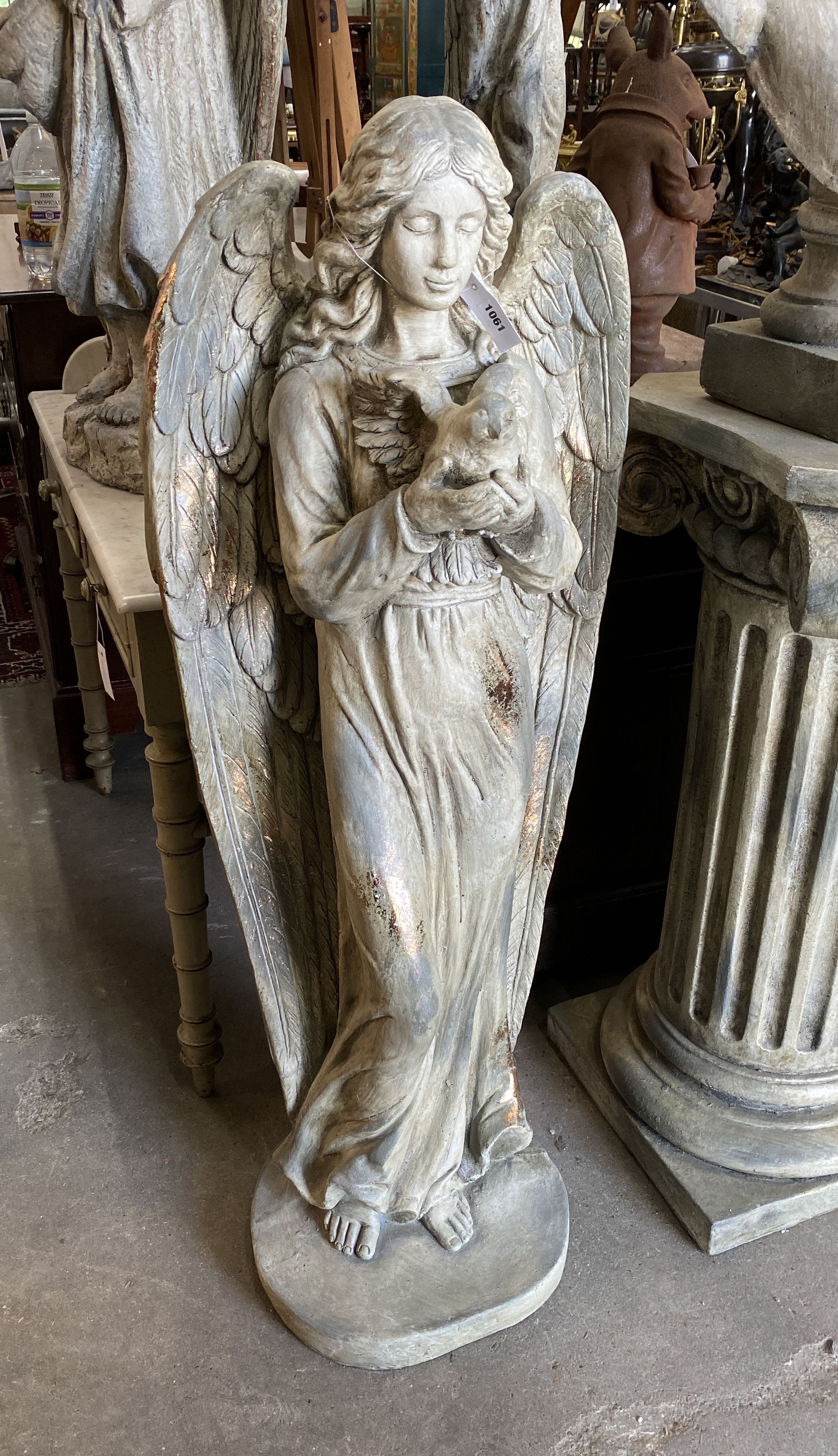 A fibre clay parcel gilt 'Angel and Dove' garden ornament, height 119cm